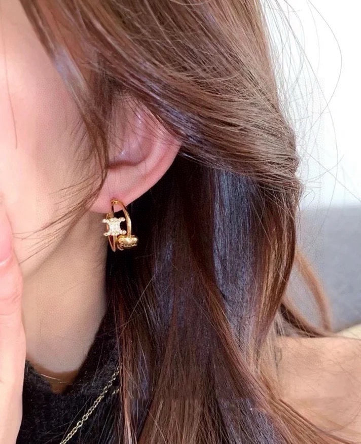 Triomphe-Inspired Emblem Stud Earrings in Polished Metal-Tone – Design 03 detail view
