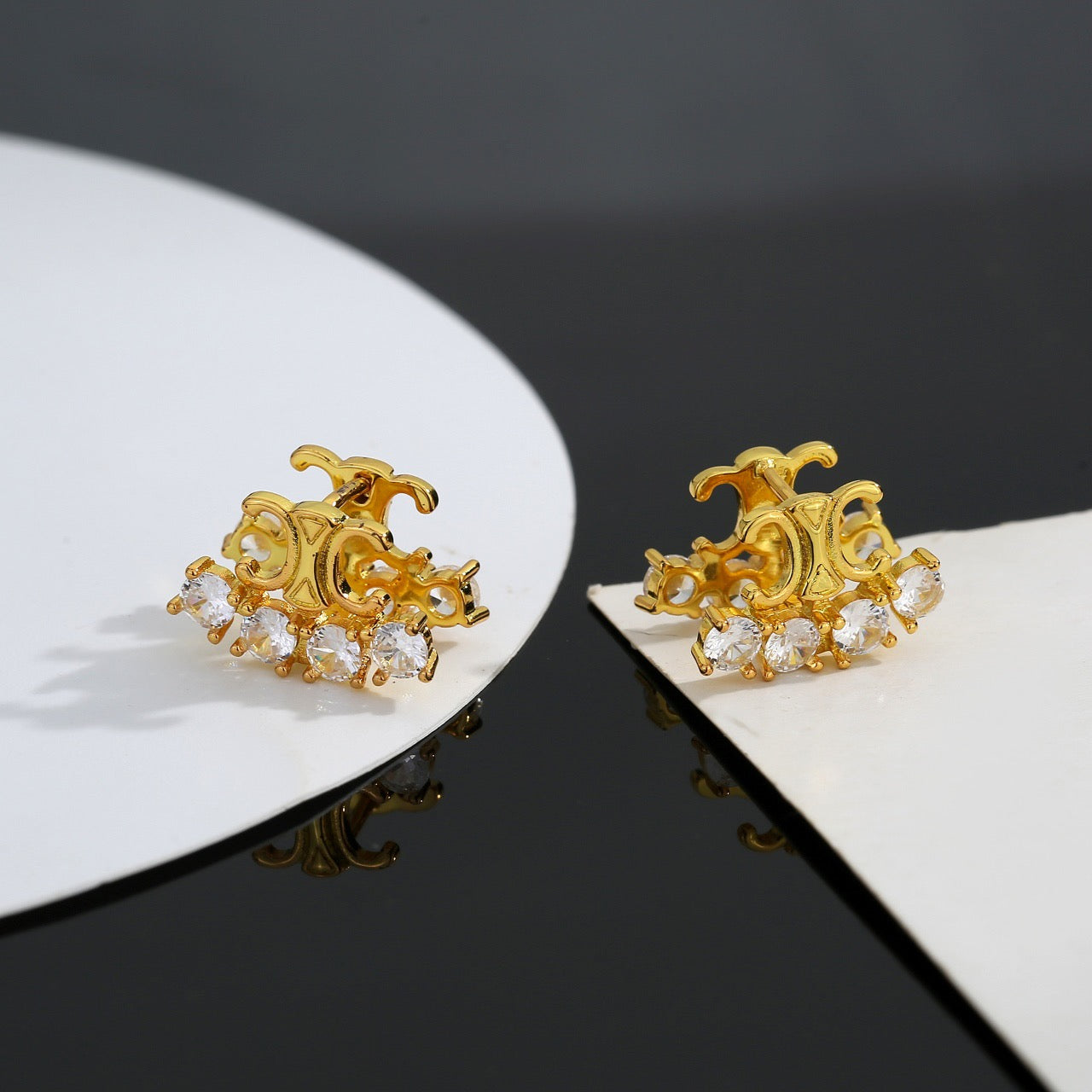 Signature Emblem Stud Earrings in Gold-Tone – Design 06 close-up view