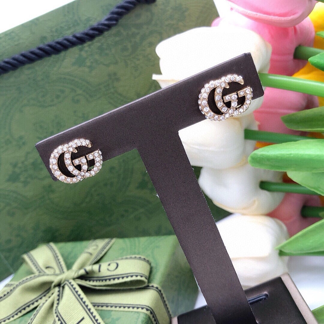Double-G Emblem Stud Earrings in Polished Metal-Tone – Design 004 styled product view