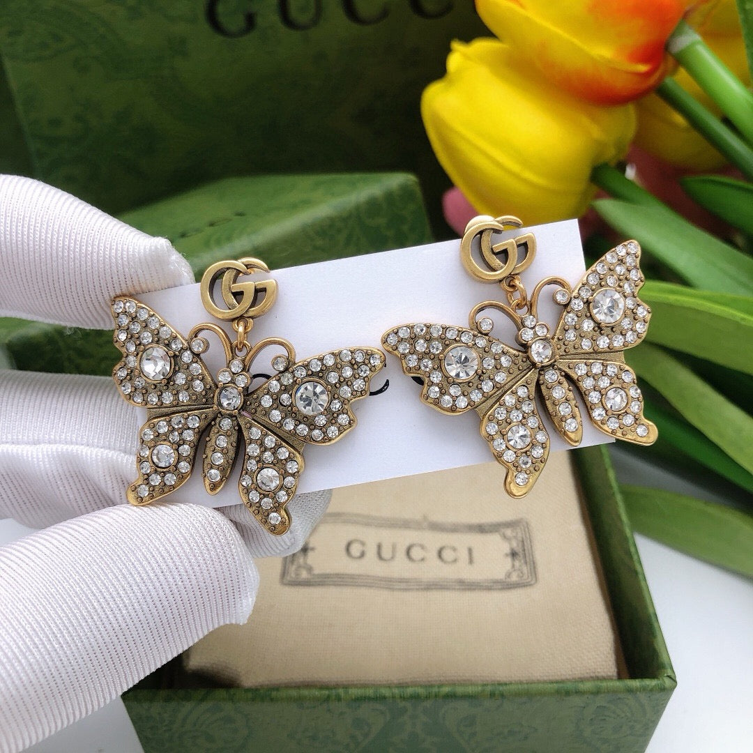 Geometric Emblem Stud Earrings in Polished Metal-Tone – Design 010 front product view