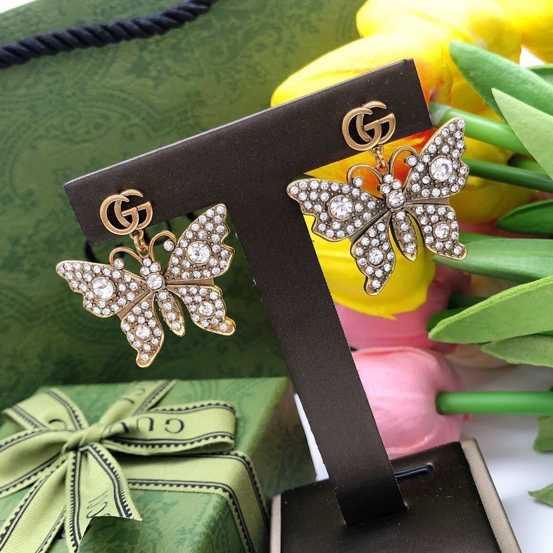 Geometric Emblem Stud Earrings in Polished Metal-Tone – Design 010 close-up detail