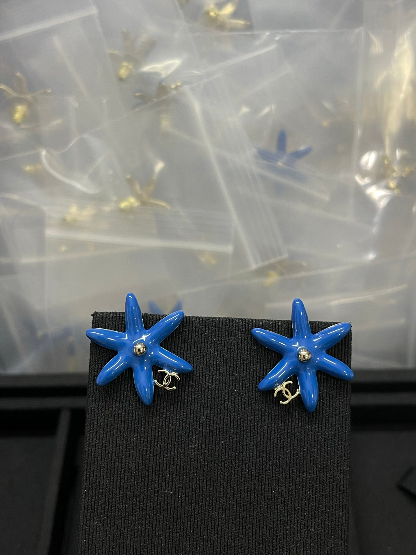 Floral Stud Earrings in Polished Metal-Tone – Blue Detail detail view