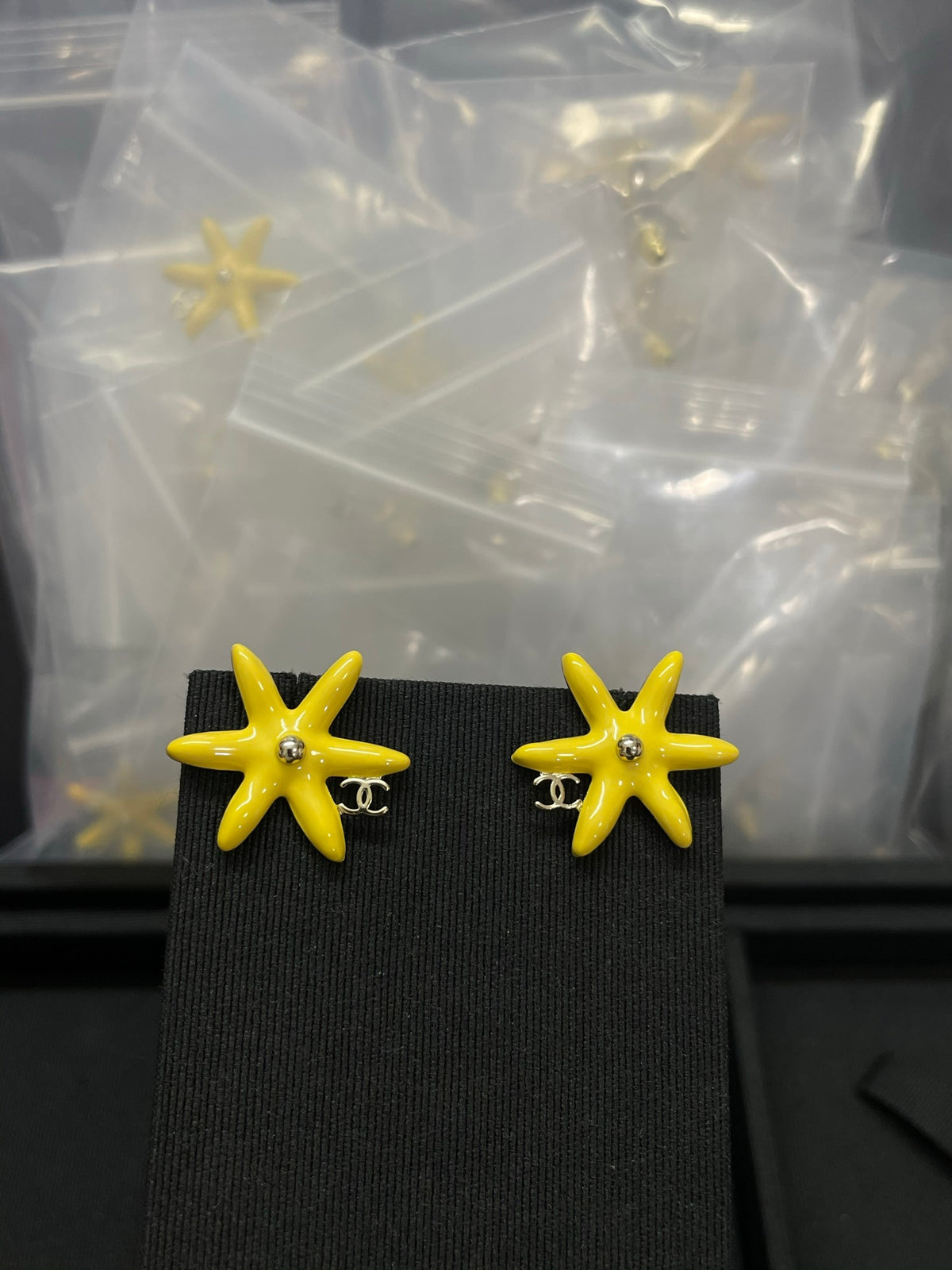 Floral Stud Earrings in Polished Metal-Tone – Blue Detail close-up detail