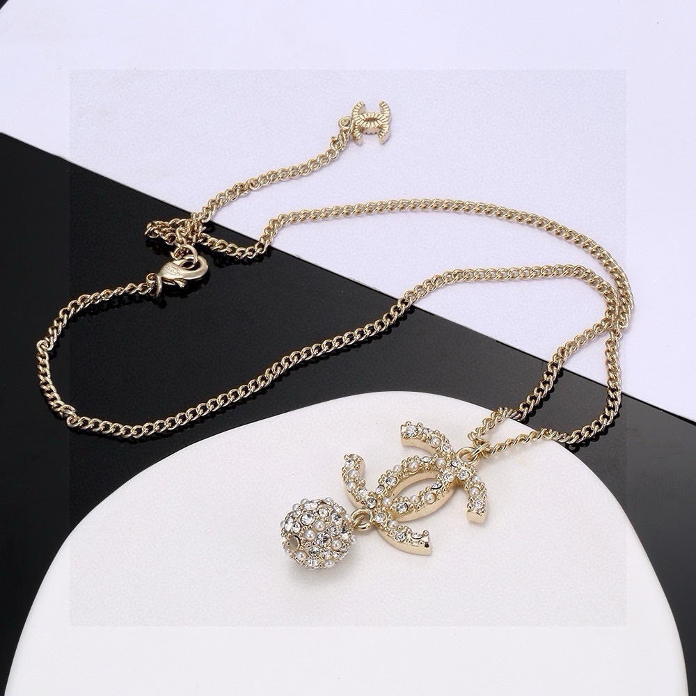 Double-C Emblem Pearl-Detail Pendant Necklace – Pearl Detail – Design 009 detail view