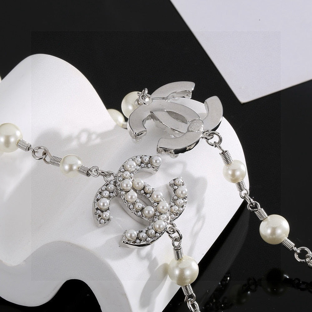 Double-C Emblem Pearl-Detail Pendant Necklace – Pearl Detail – Design 008 close-up detail