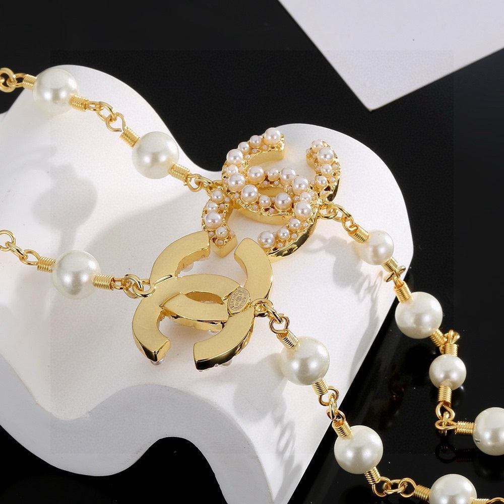 Double-C Emblem Pearl-Detail Pendant Necklace – Pearl Detail – Design 008 styled product view