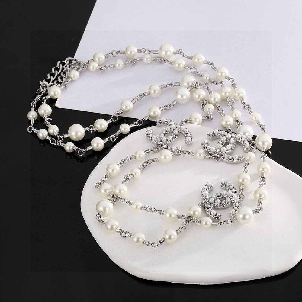 Double-C Emblem Pearl-Detail Pendant Necklace – Pearl Detail – Design 008 detail view