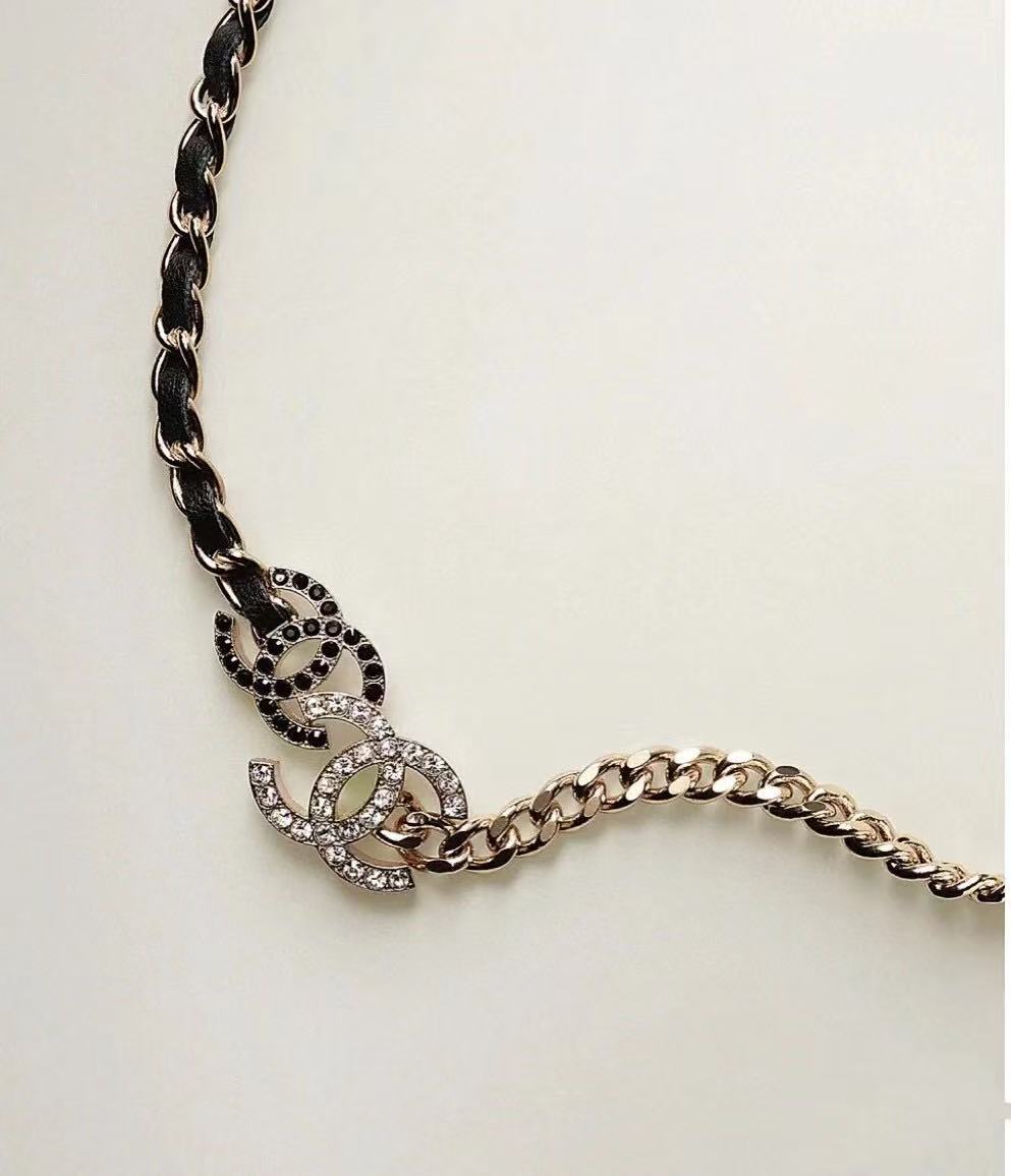 Signature Emblem Pendant Necklace in Gold-Tone – Black Detail close-up detail