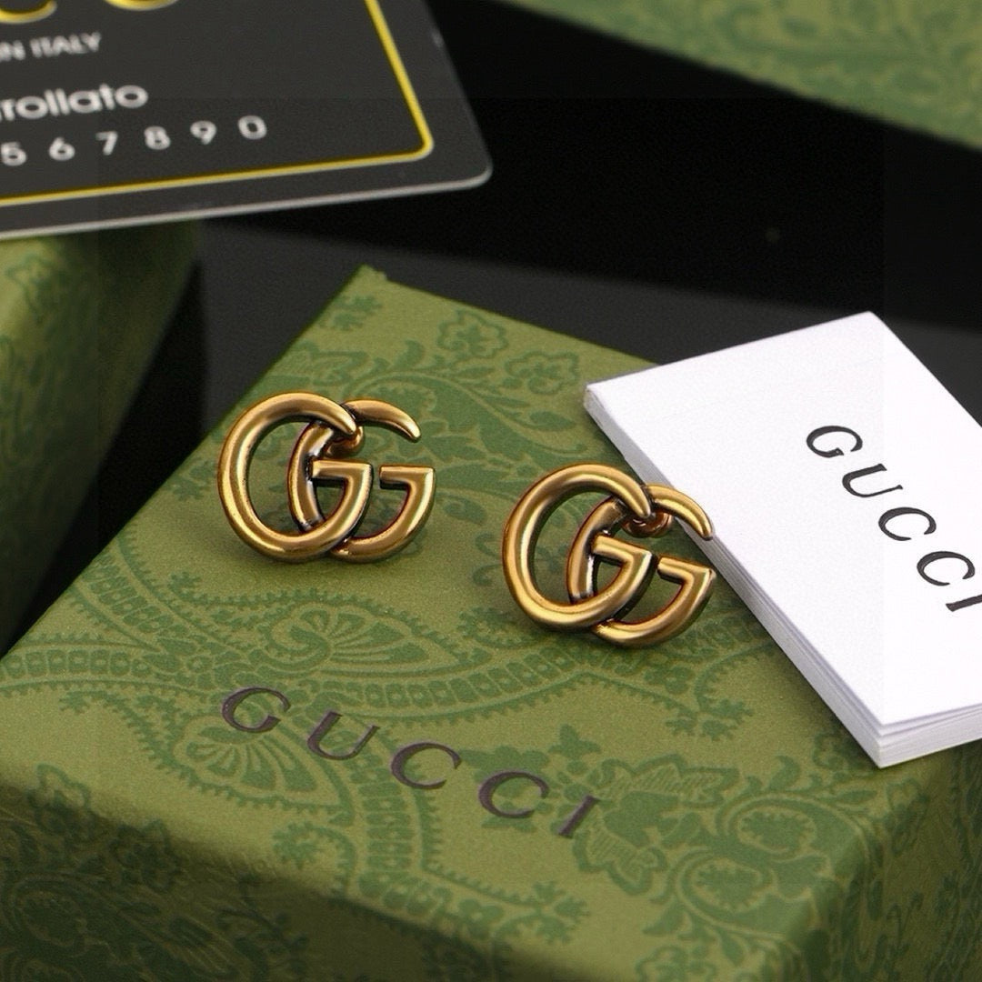 Geometric Emblem Stud Earrings in Polished Metal-Tone – Design 044 front product view