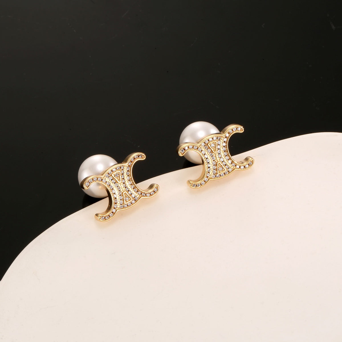 Signature Emblem Stud Earrings in Gold-Tone – Design 01 close-up view