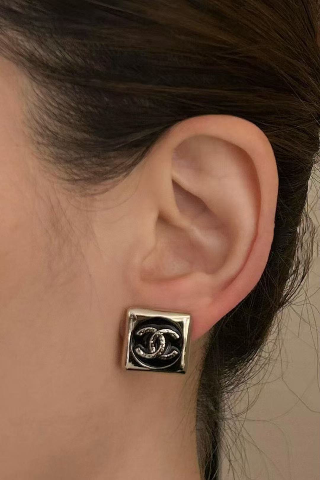 Double-C Emblem Stud Earrings in Polished Metal-Tone – Design 020 front product view