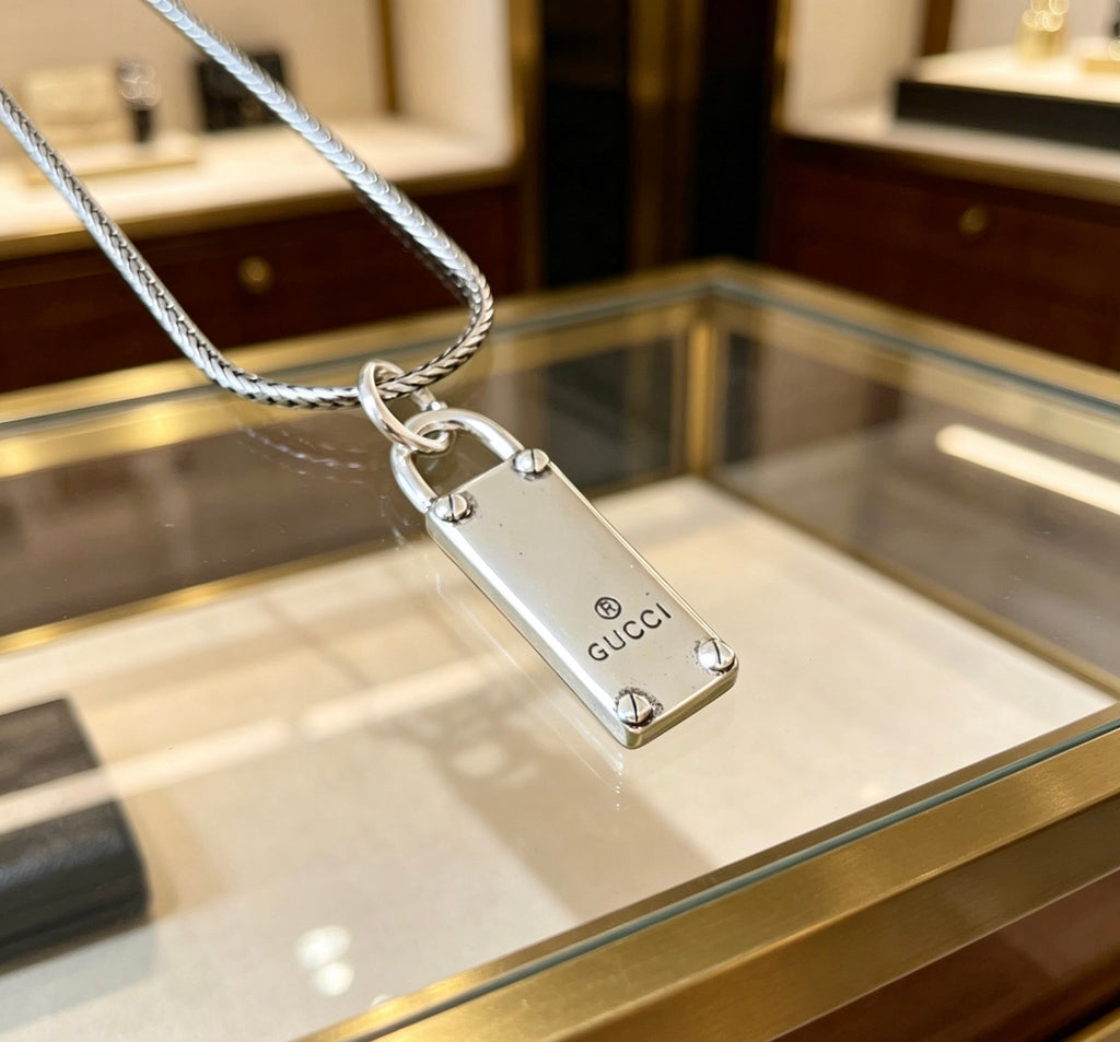 Double-G Emblem Pendant Necklace in Polished Metal-Tone – Design 186 close-up detail