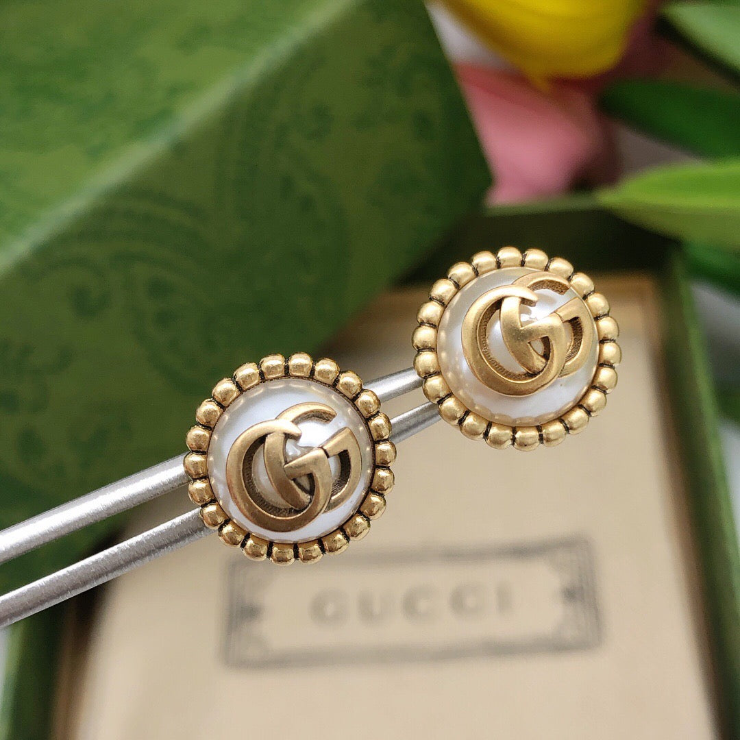 Double-G Emblem Stud Earrings in Polished Metal-Tone – Vintage Detail – Design 007 styled product view
