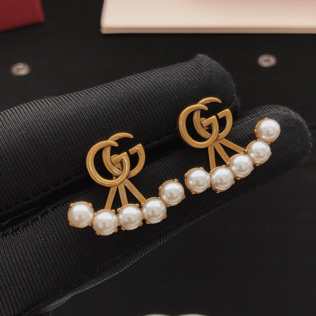Geometric Emblem Stud Earrings in Gold-Tone – Design 002 detail view