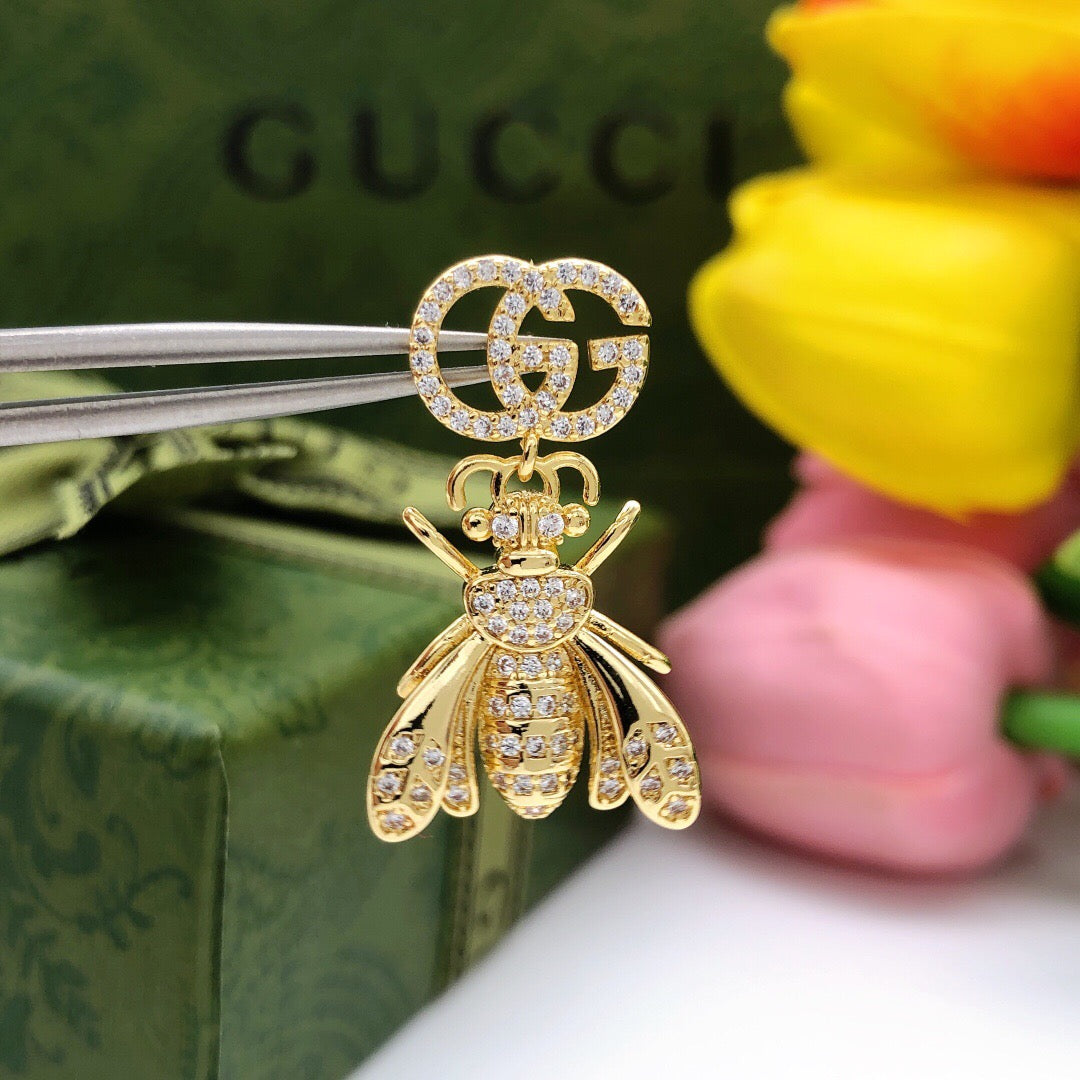 Bee Statement Earrings in Polished Metal-Tone – Bee Detail detail view