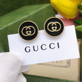 Double-G Emblem Stud Earrings in Polished Metal-Tone – Design 012 main product view