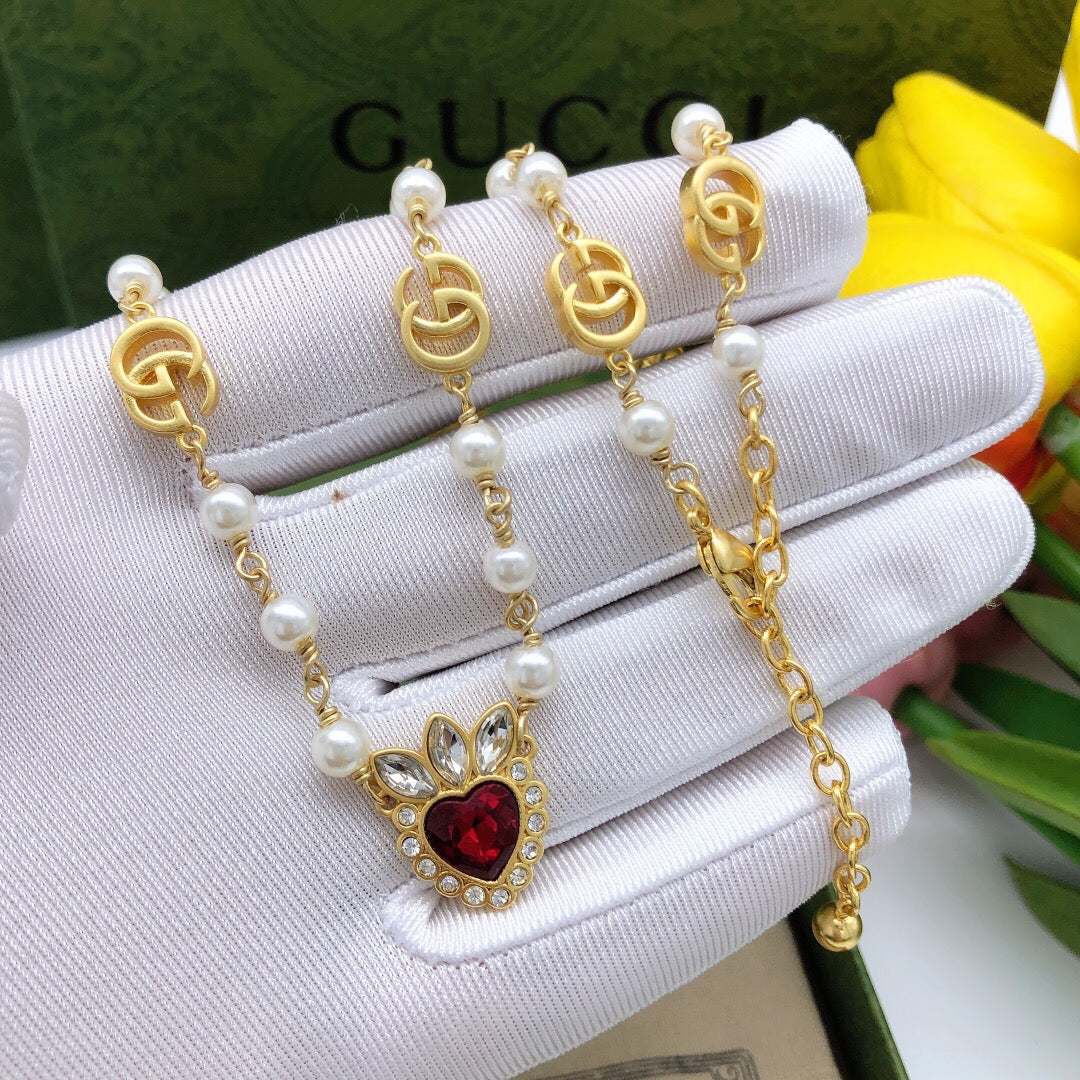 Heart Pendant Necklace in Polished Metal-Tone – Red Detail styled product view