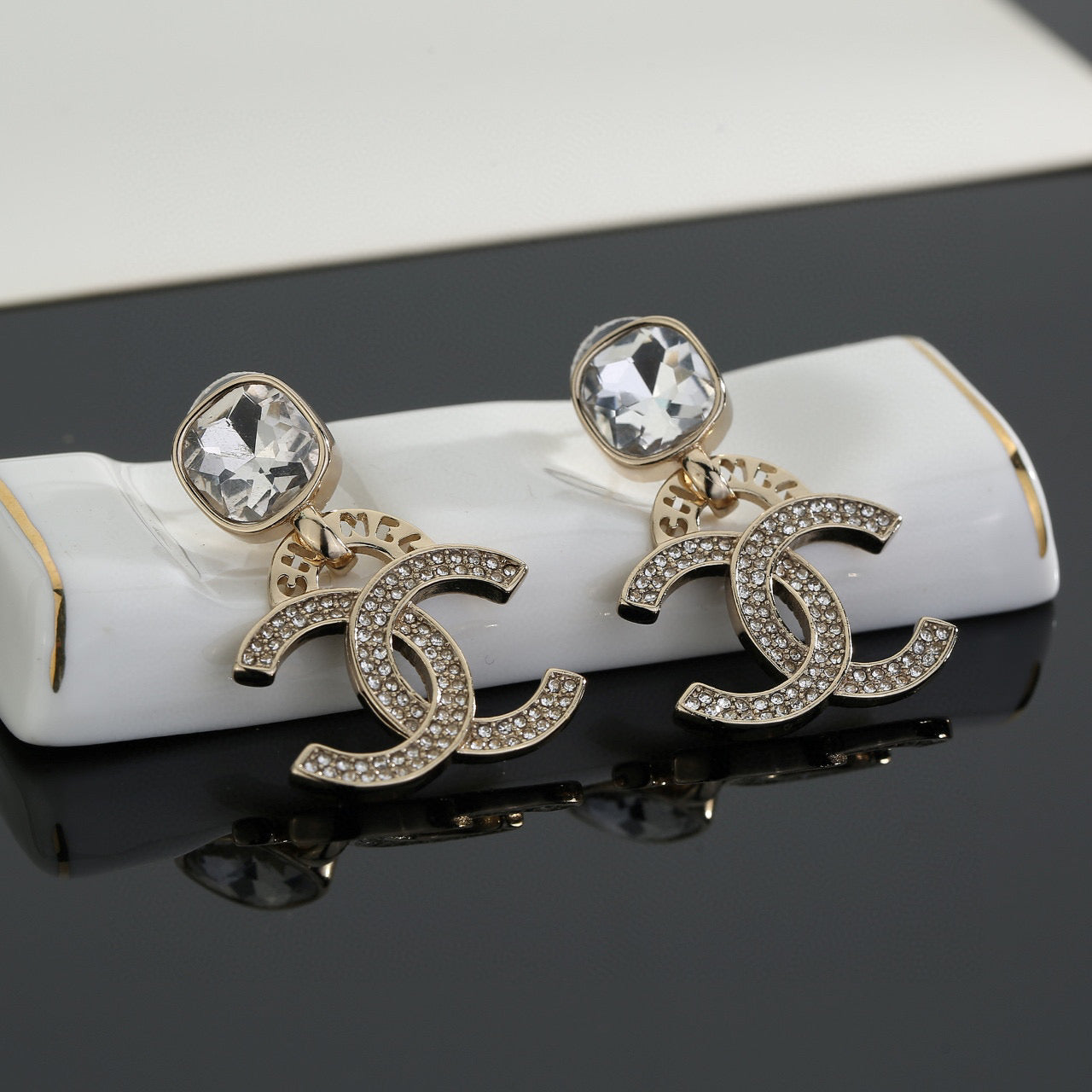 Double-C Emblem Stud Earrings in Gold-Tone – Design 034 side detail