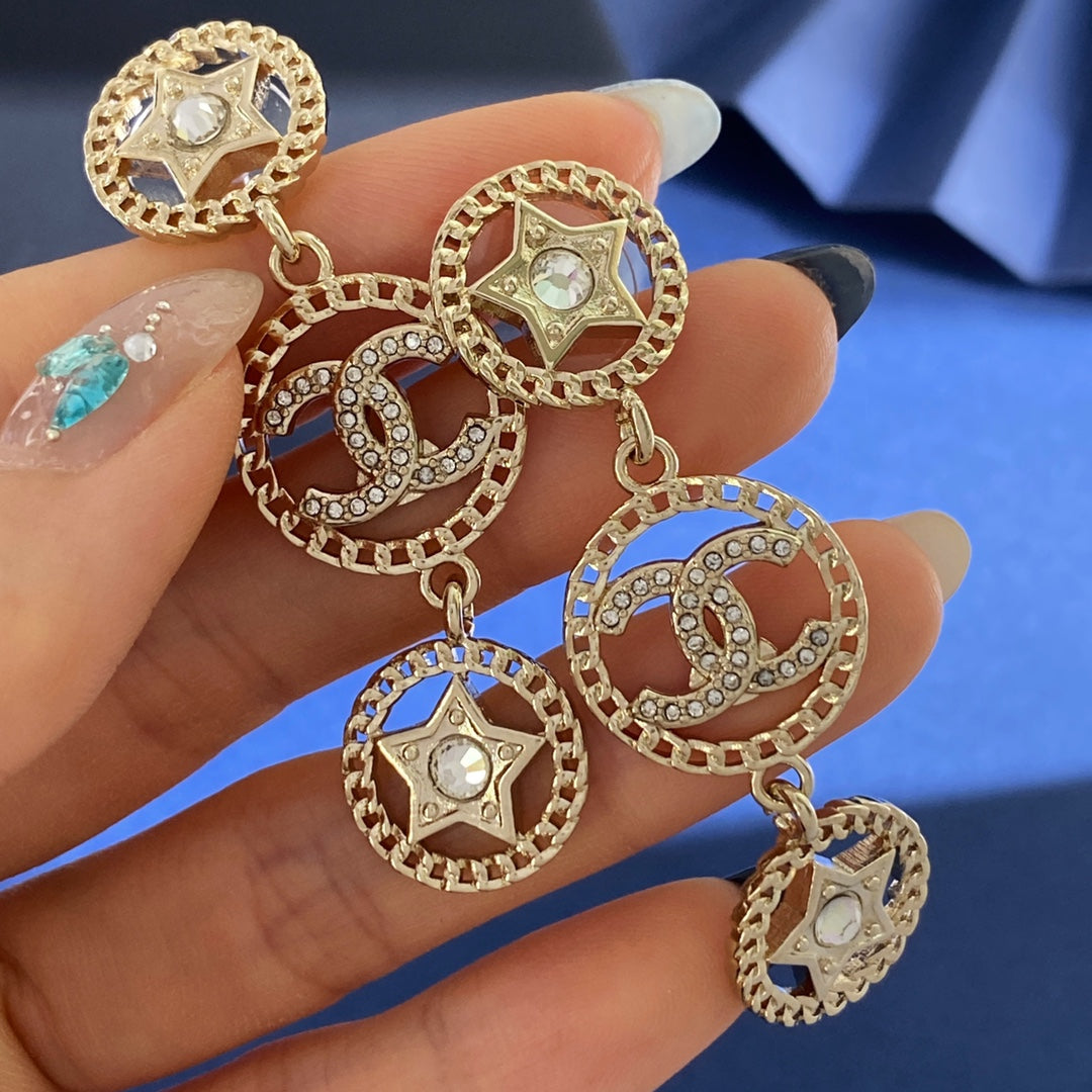 Double-C Emblem Stud Earrings in Gold-Tone – Star Detail – Design 009 styled product view