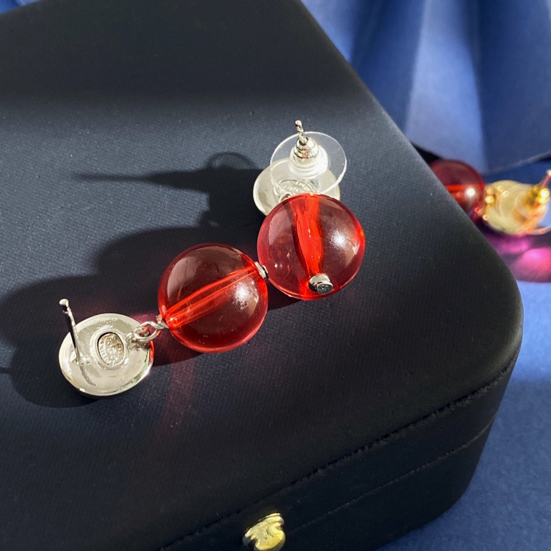 Double-C Emblem Stud Earrings in Silver-Tone – Red Detail front product view