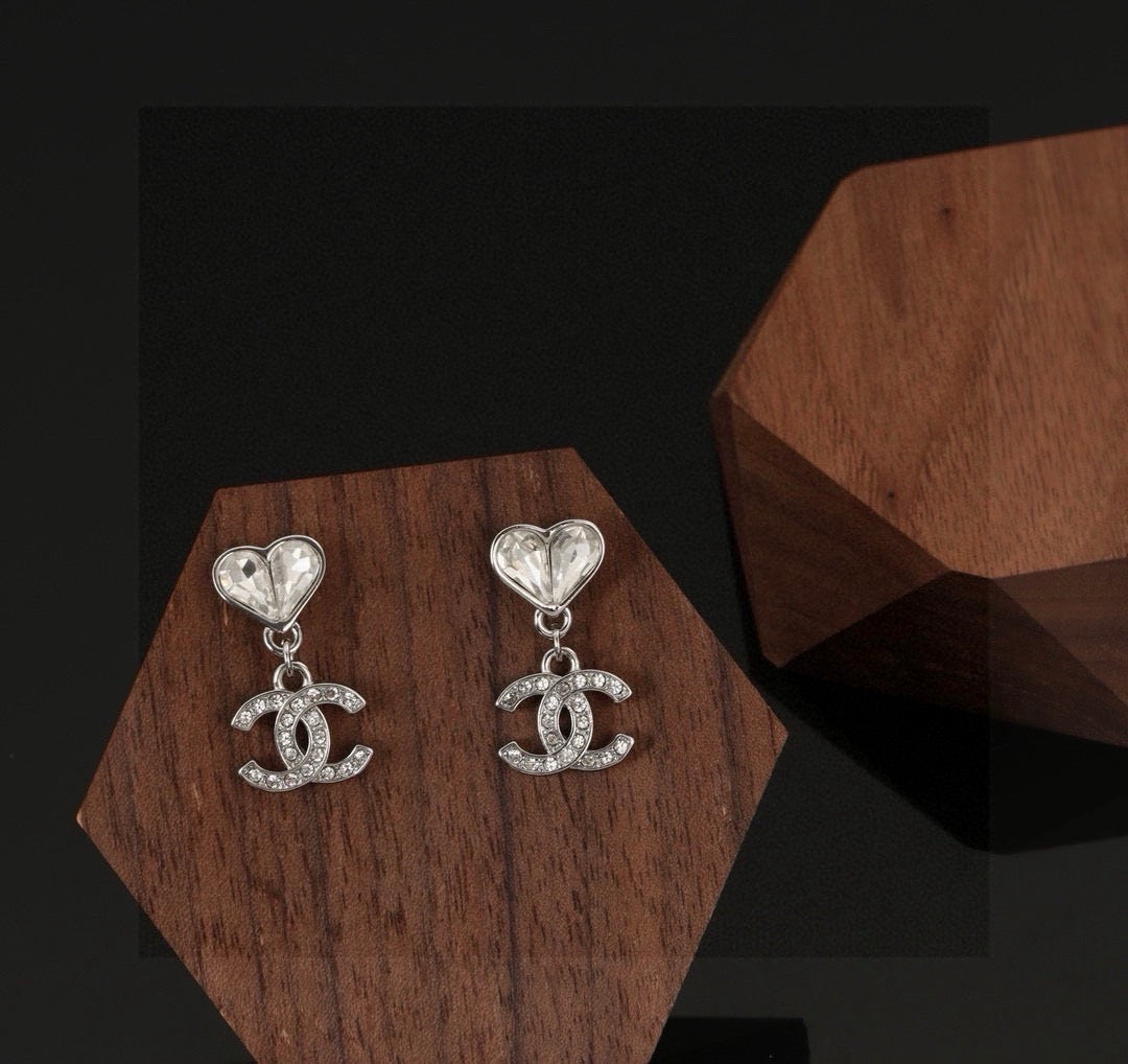 Double-C Emblem Stud Earrings in Polished Metal-Tone – Design 176 detail view