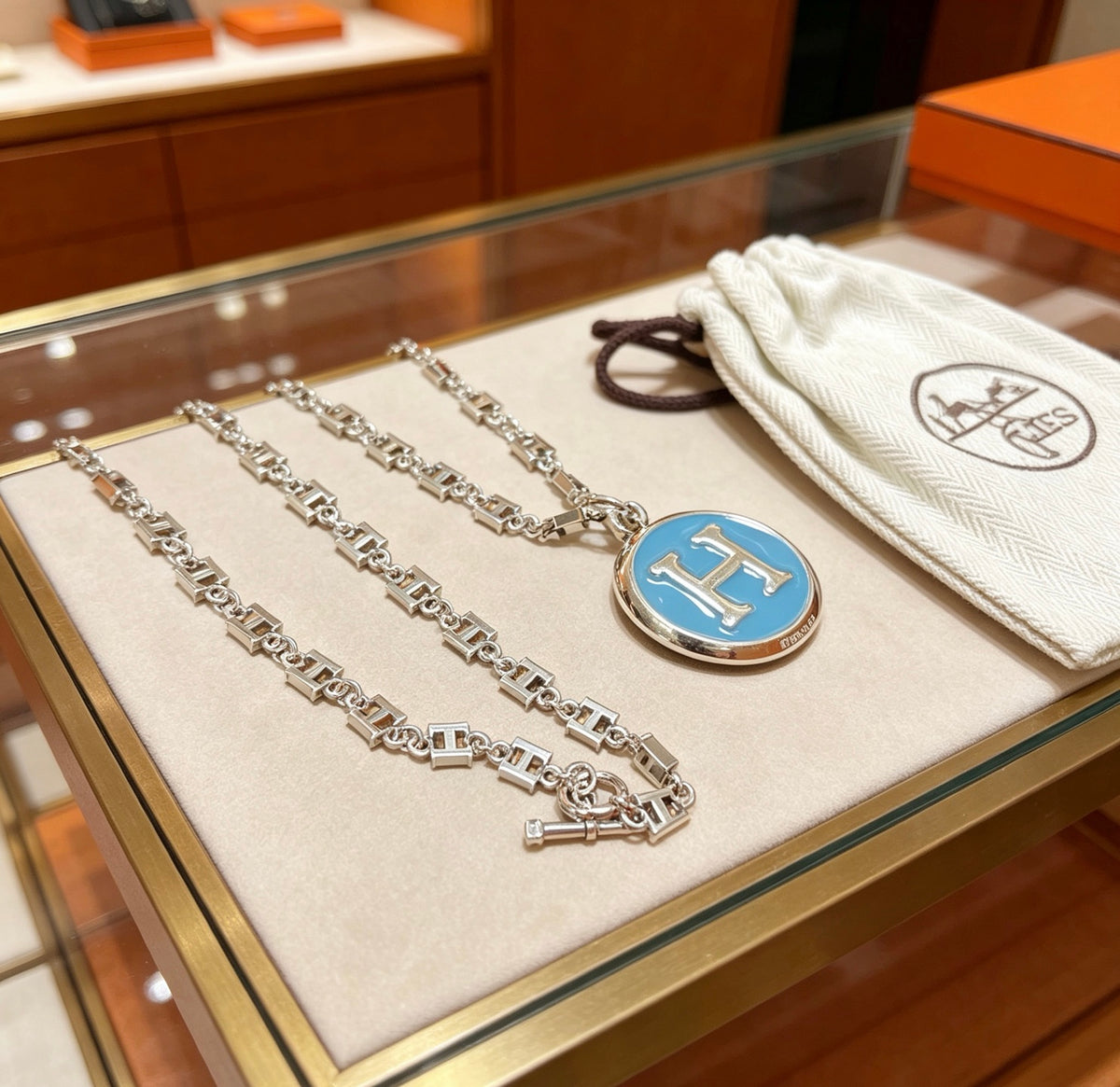 Martin Graham pendant necklace in polished metal-tone – front product view