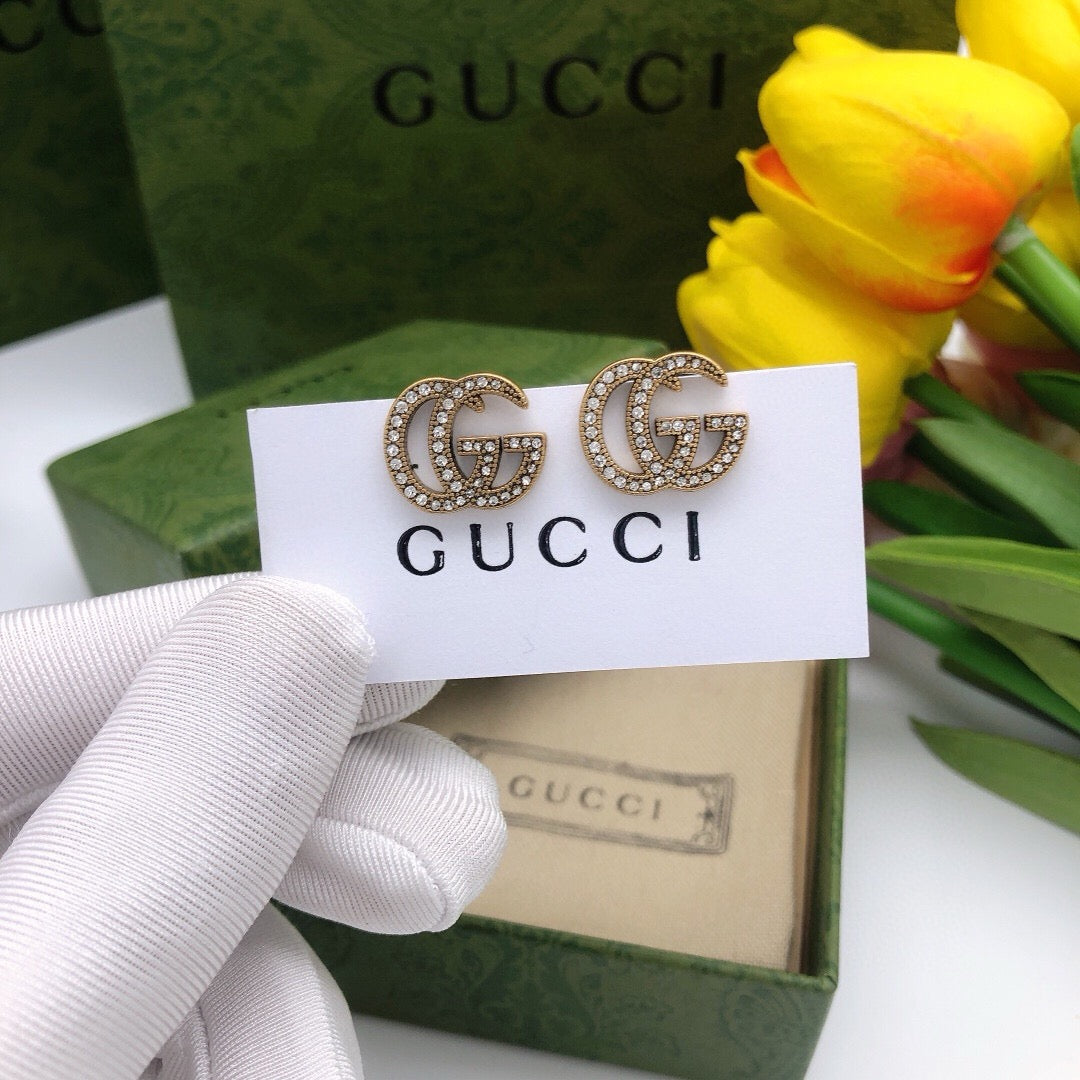 Double-G Emblem Stud Earrings in Polished Metal-Tone – Design 021 front product view