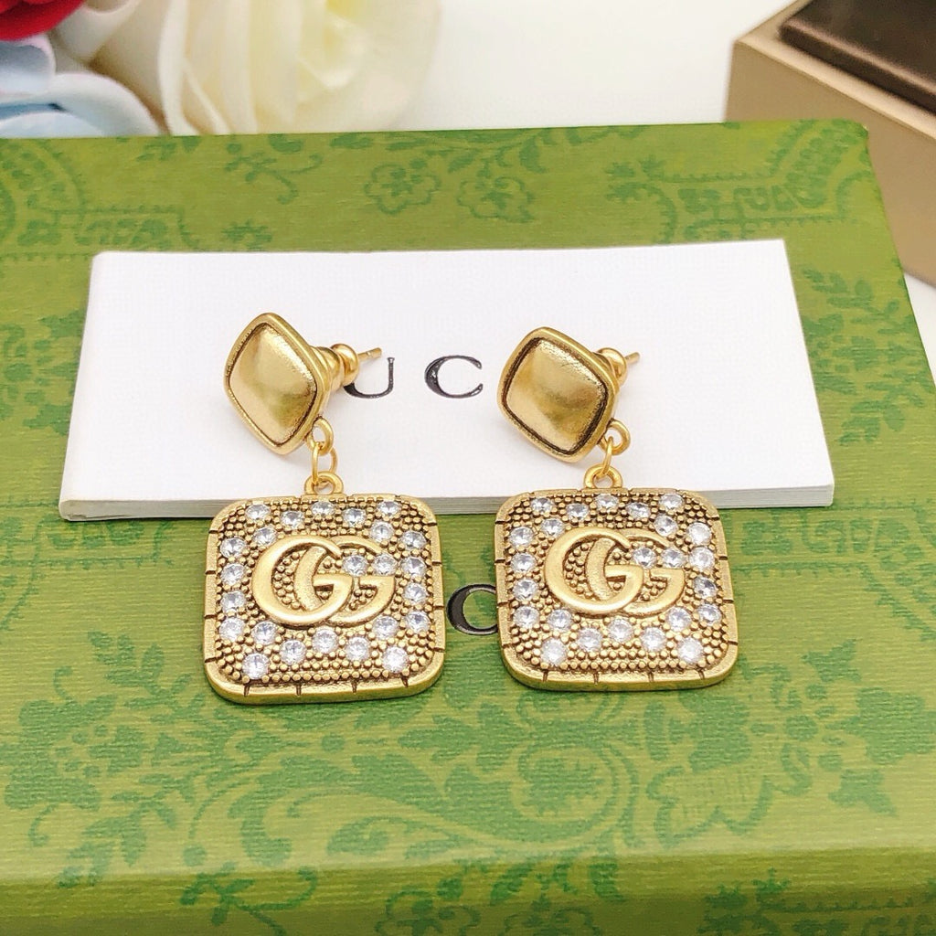 Geometric Emblem Stud Earrings in Polished Metal-Tone – Design 026 styled product view