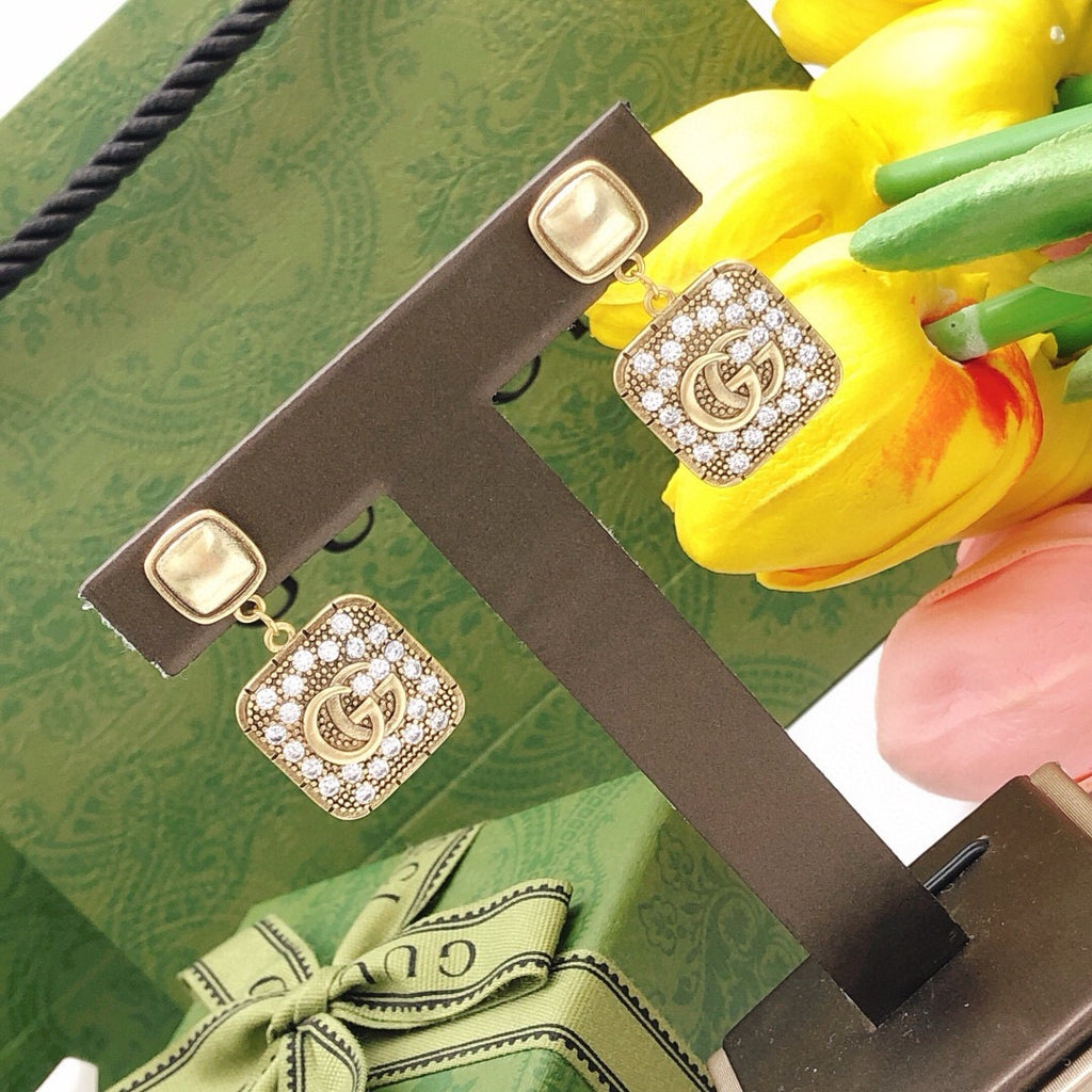 Geometric Emblem Stud Earrings in Polished Metal-Tone – Design 026 close-up detail