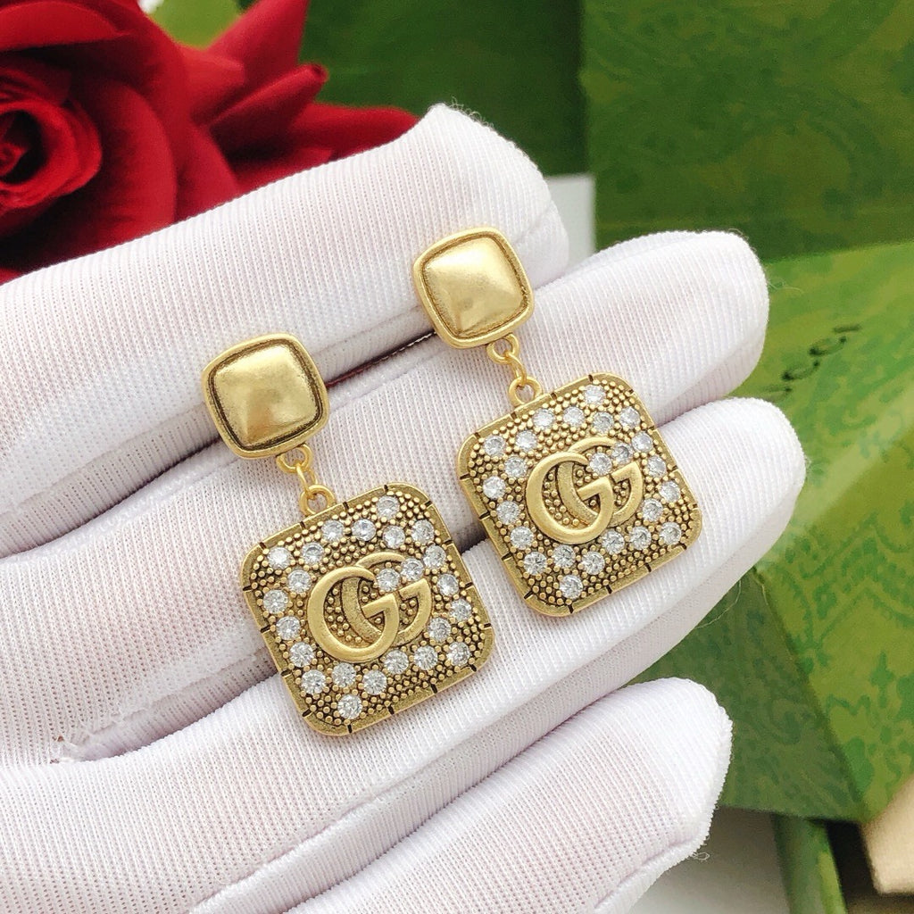 Geometric Emblem Stud Earrings in Polished Metal-Tone – Design 026 side detail