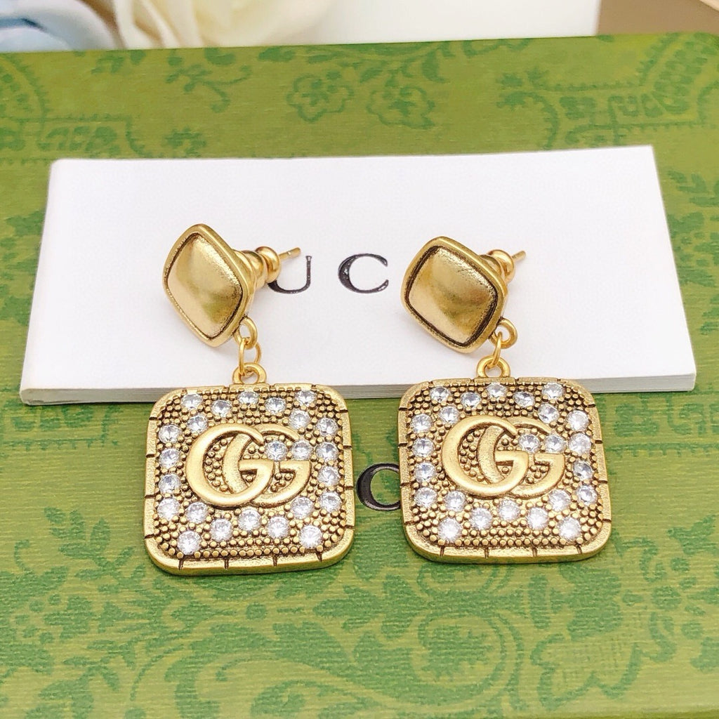 Geometric Emblem Stud Earrings in Polished Metal-Tone – Design 026 front product view