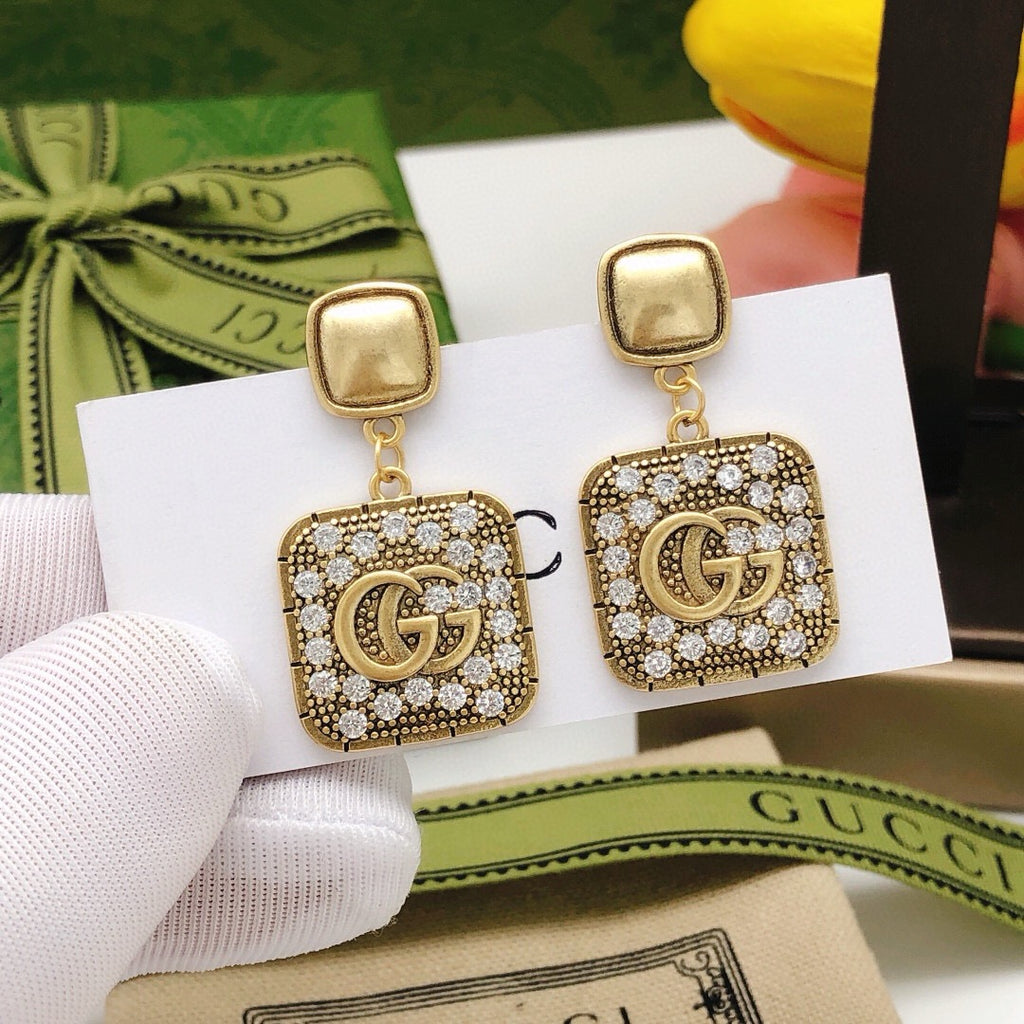 Geometric Emblem Stud Earrings in Polished Metal-Tone – Design 026 front product view