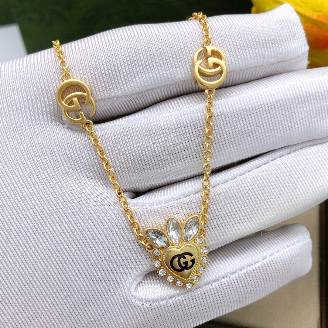 Double-G Emblem Pendant Necklace in Polished Metal-Tone – Crystal Detail – Design 005 main product view