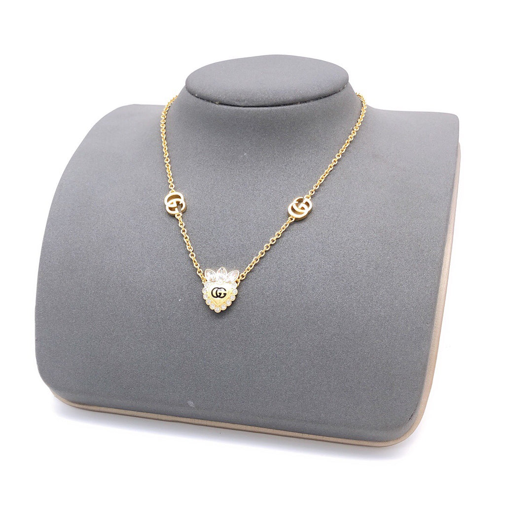 Double-G Emblem Pendant Necklace in Polished Metal-Tone – Crystal Detail – Design 005 styled product view