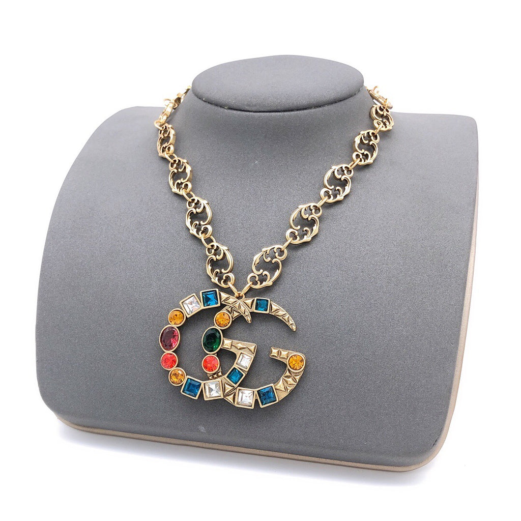 Double-G Emblem Pendant Necklace in Polished Metal-Tone – Crystal Detail – Design 003 styled product view