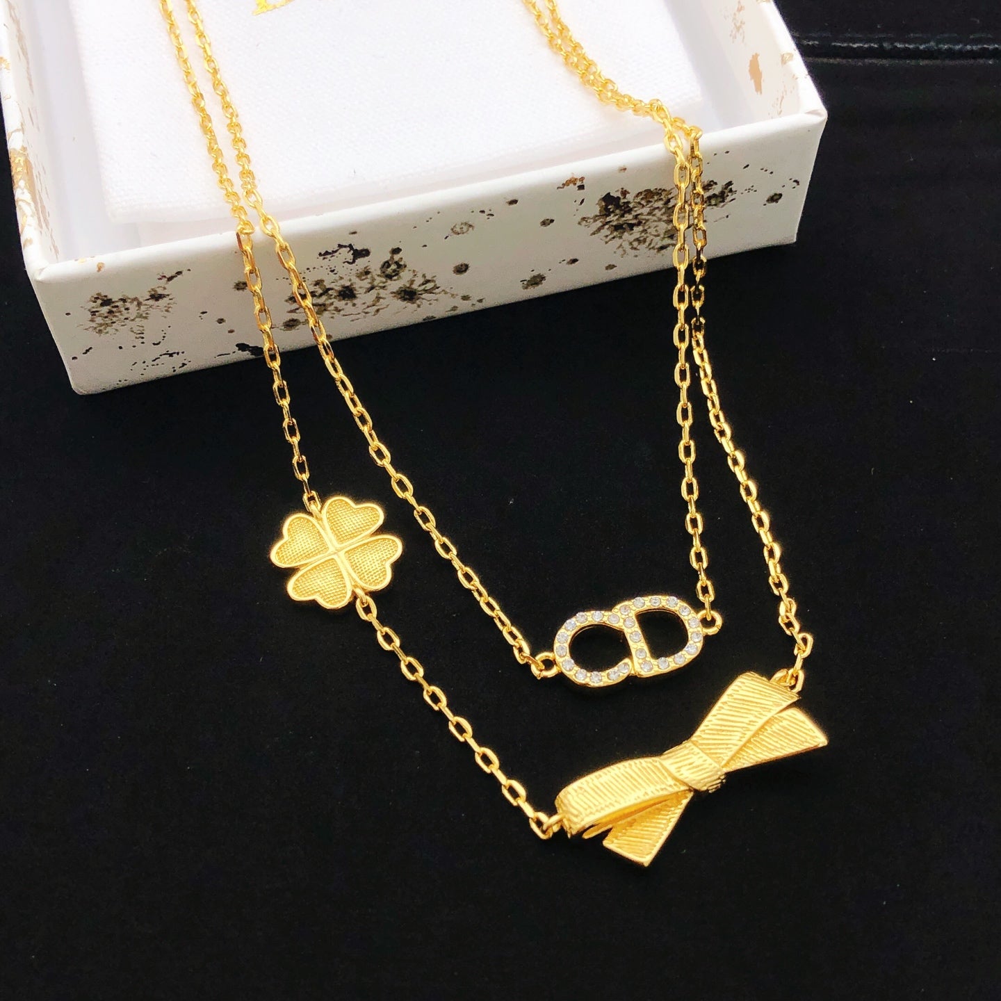 Bow & Butterfly Motif Pendant Necklace in Polished Metal-Tone with Layered Detail – Design 004 main product view