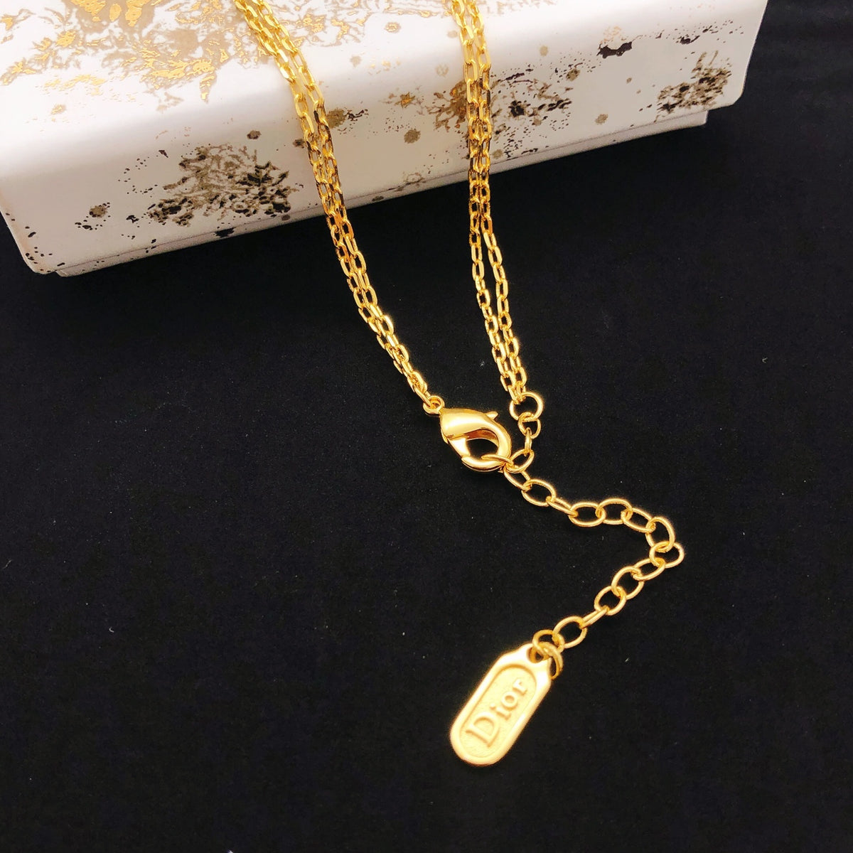 Bow & Butterfly Motif Pendant Necklace in Polished Metal-Tone with Layered Detail – Design 004 detail view