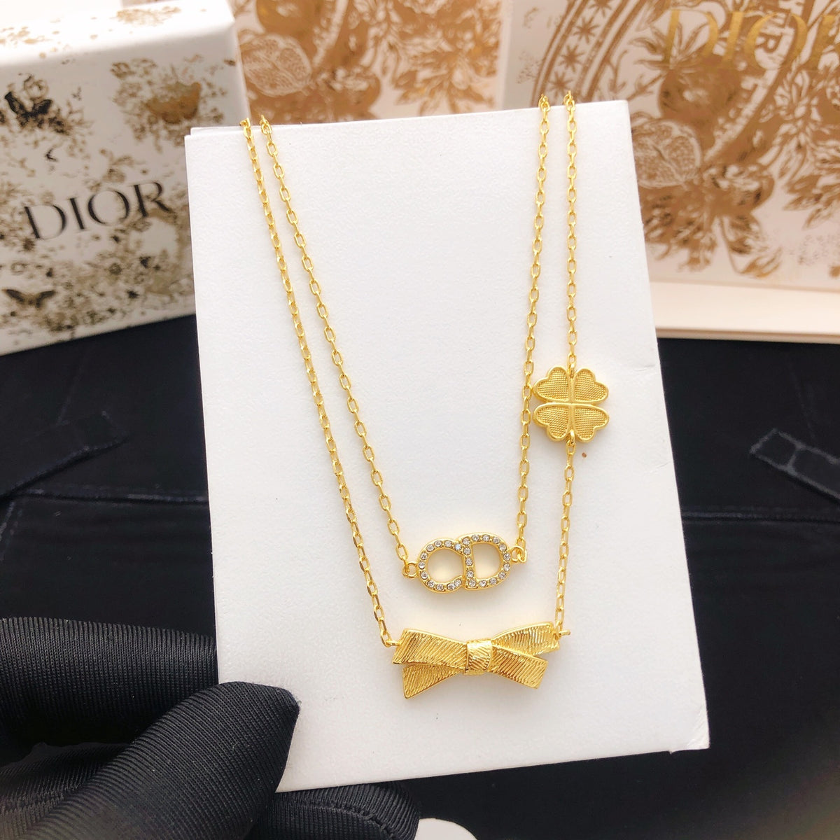 Bow & Butterfly Motif Pendant Necklace in Polished Metal-Tone with Layered Detail – Design 004 styled view