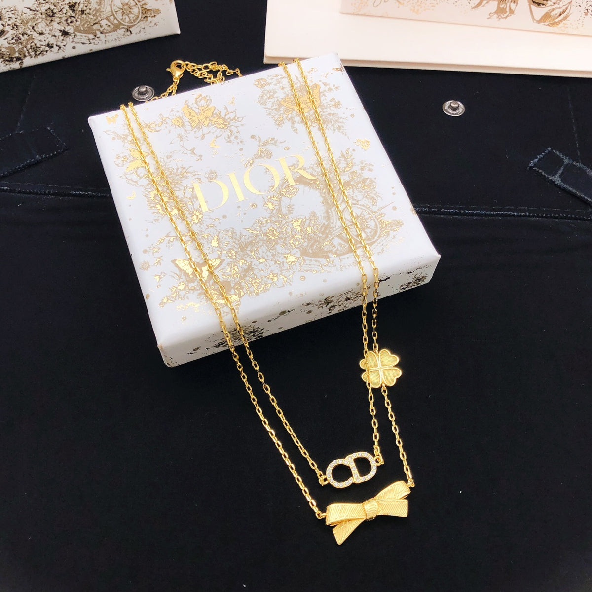 Bow & Butterfly Motif Pendant Necklace in Polished Metal-Tone with Layered Detail – Design 004 front view