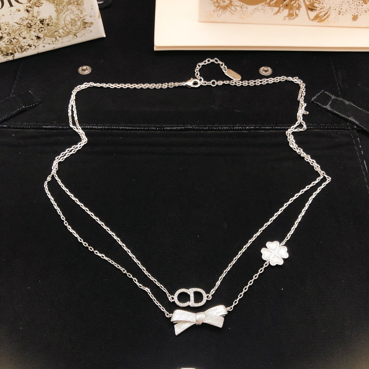 Bow & Butterfly Motif Pendant Necklace in Polished Metal-Tone with Layered Detail – Design 003 side detail