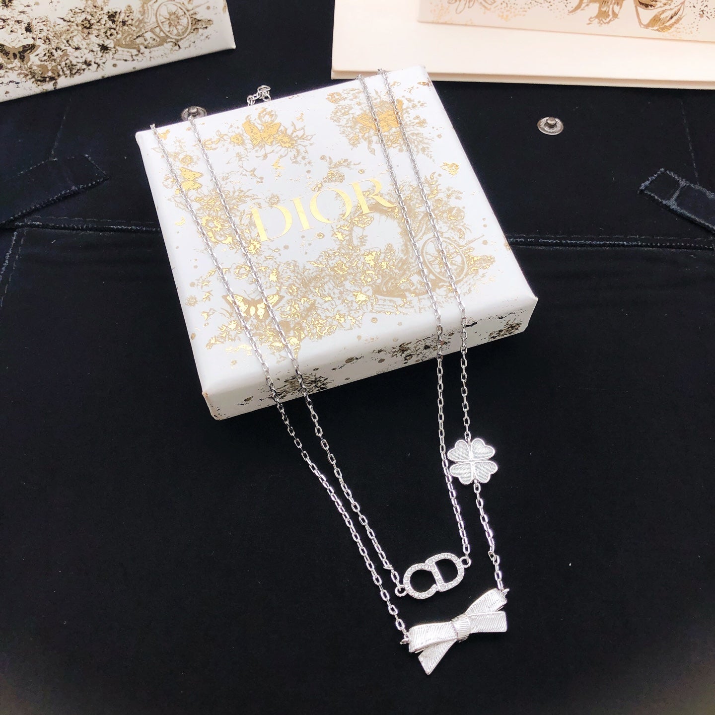 Bow & Butterfly Motif Pendant Necklace in Polished Metal-Tone with Layered Detail – Design 003 front view