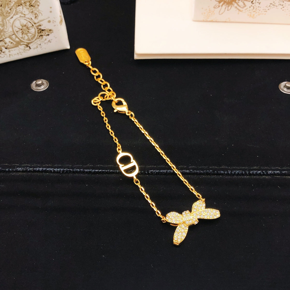 Bow & Butterfly Motif Statement Bracelet in Polished Metal-Tone – Design 002 front view