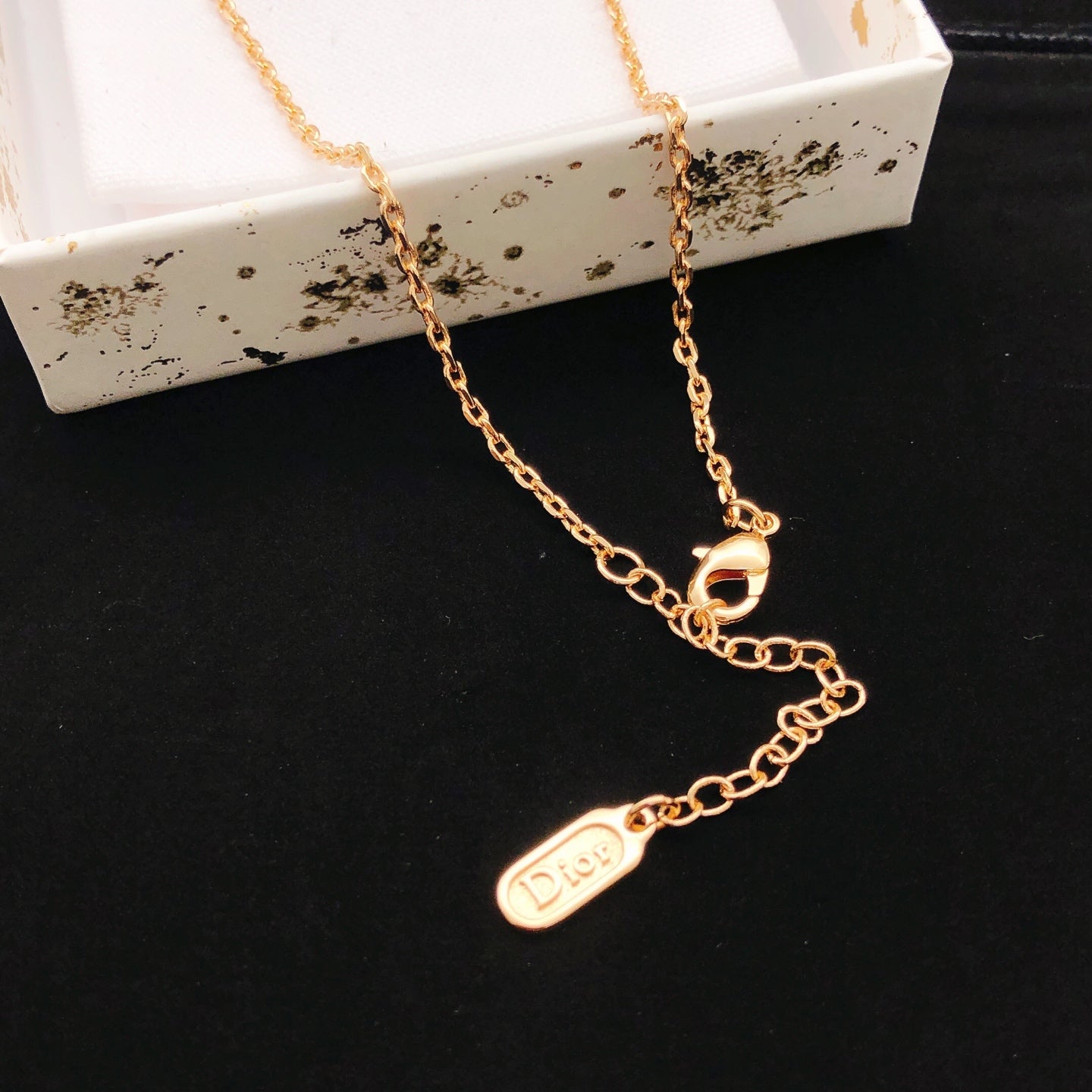 Bow & Butterfly Motif Pendant Necklace in Rose-Gold-Tone main product view