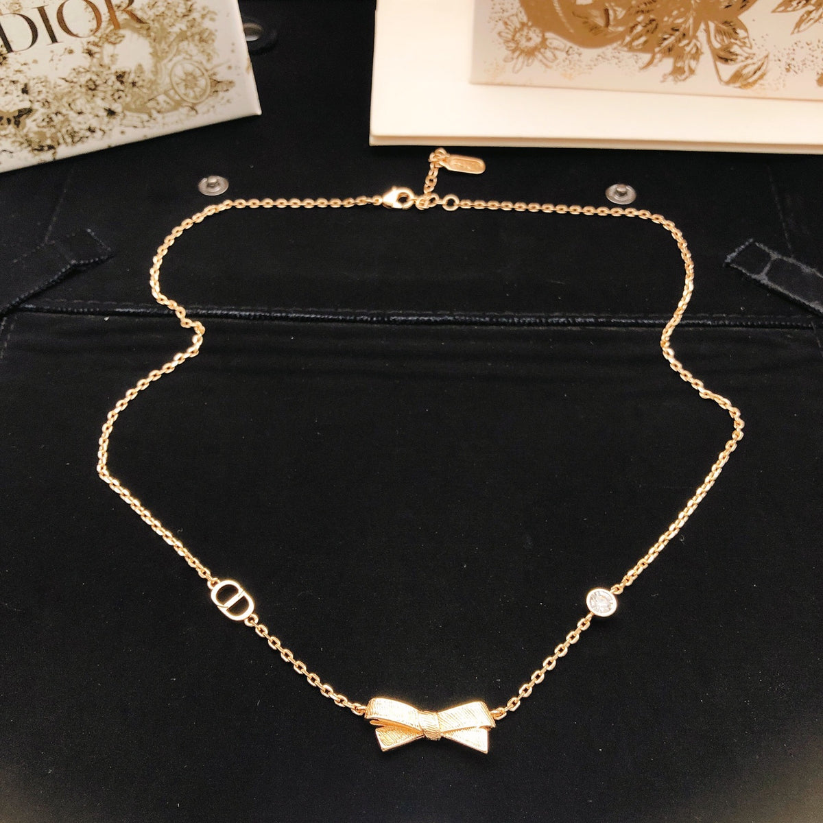 Bow & Butterfly Motif Pendant Necklace in Rose-Gold-Tone styled view