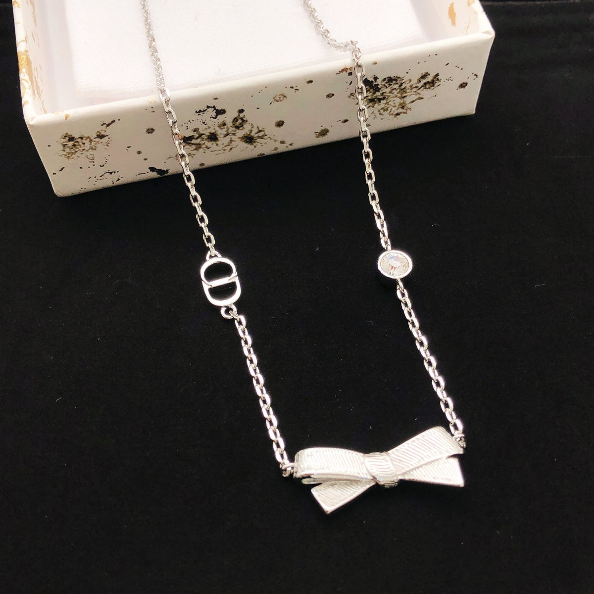 Bow & Butterfly Motif Pendant Necklace in Polished Metal-Tone – Design 004 main product view