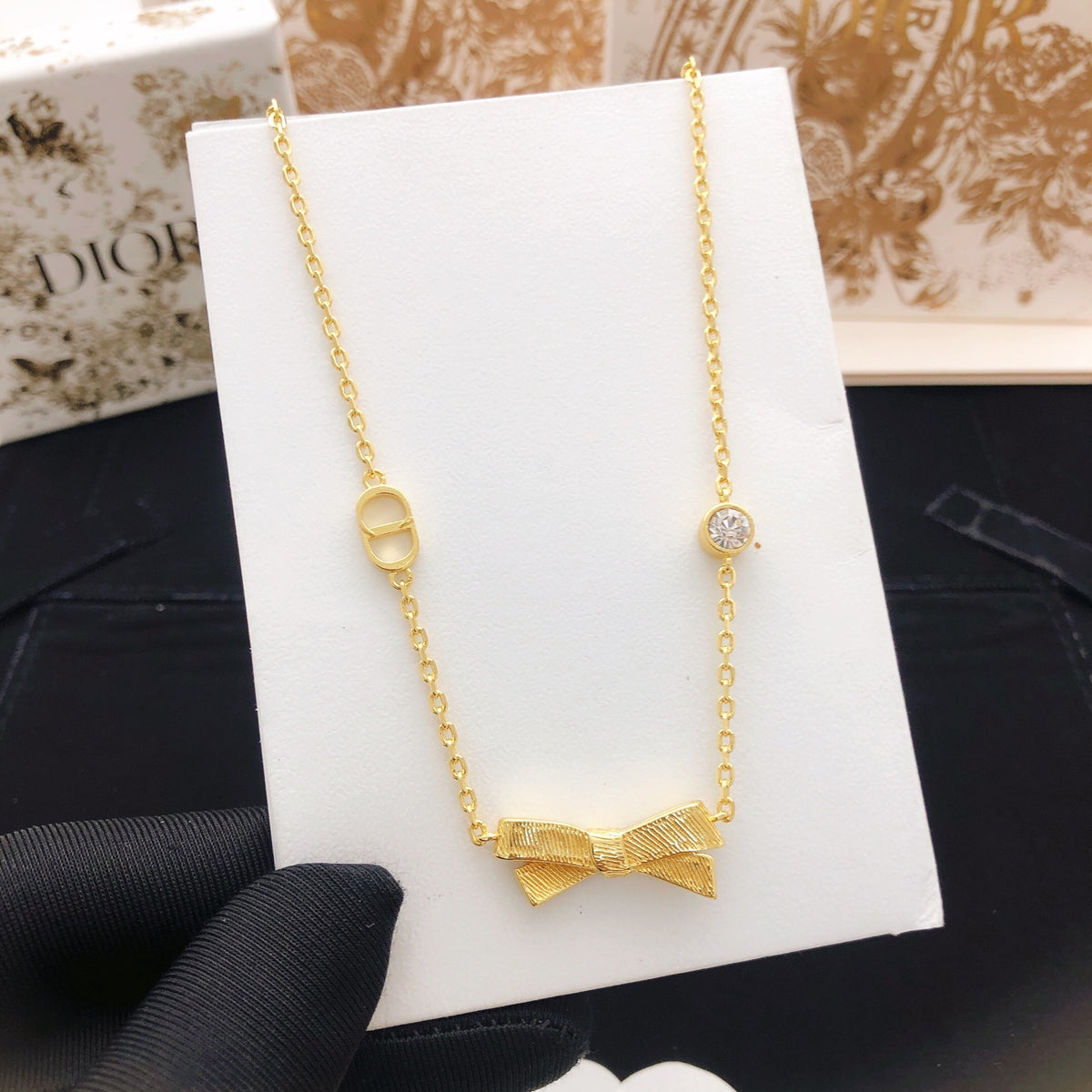 Bow & Butterfly Motif Pendant Necklace in Polished Metal-Tone – Design 003 close-up detail