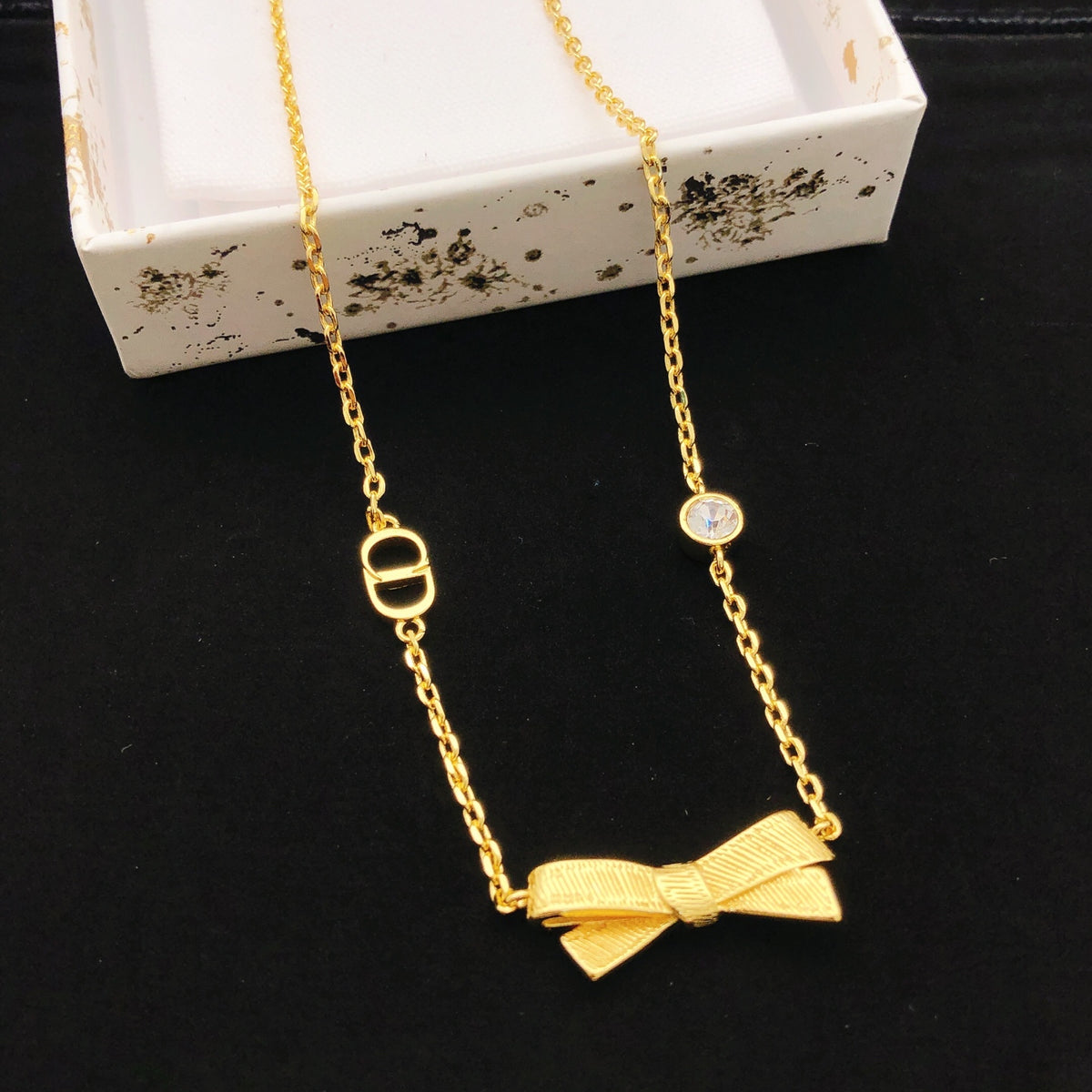 Bow & Butterfly Motif Pendant Necklace in Polished Metal-Tone – Design 003 main product view