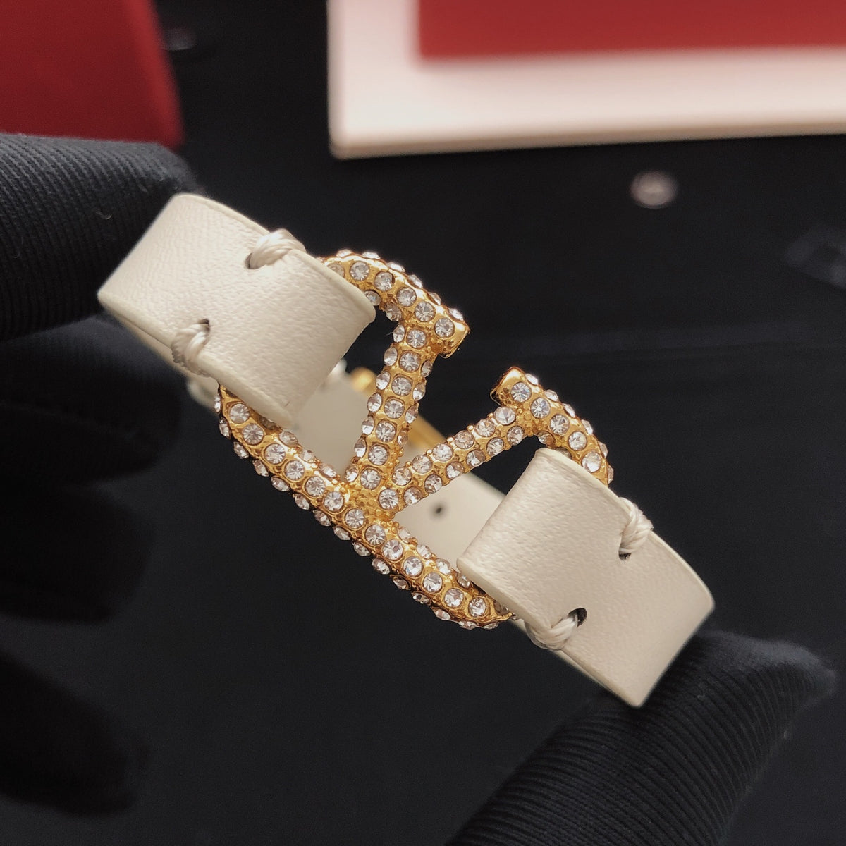 Signature Emblem Bracelet in Gold-Tone – White – Design 02 close-up view