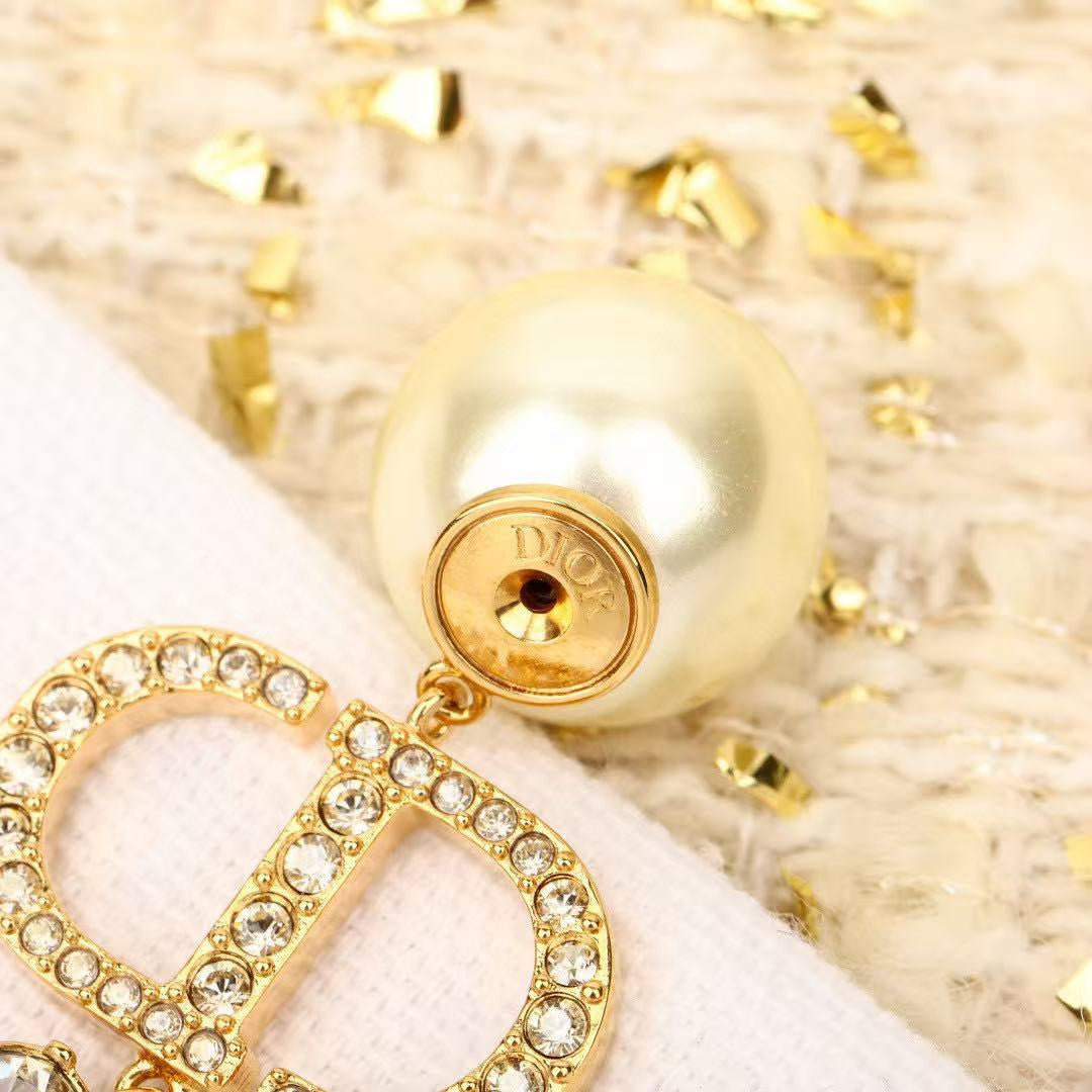 Pearl-Style Motif Stud Earrings in Polished Metal-Tone with Pearl-Style Detail – Design 014 styled view