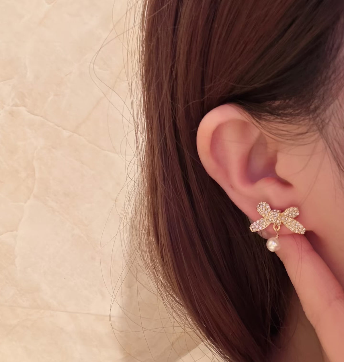 Bow & Butterfly Motif Stud Earrings in Polished Metal-Tone with Crystal-Style Accents – Design 001 styled view